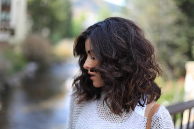How To Get Frizz-Free Curls