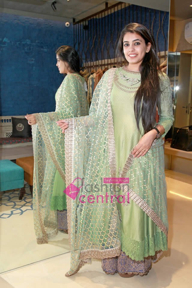 Guest at the event trying an Anju Modi ensemble