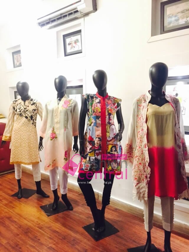 Outfits on display at L'atelier Fashion Day Out